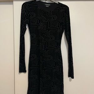 Black patterned long-sleeve midi with open back